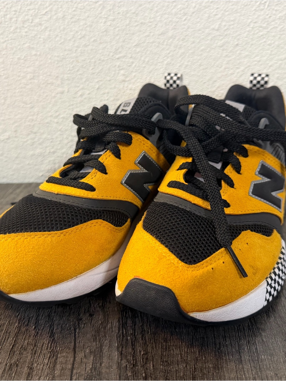 New Balance Yellow and Black Athletic Sneakers